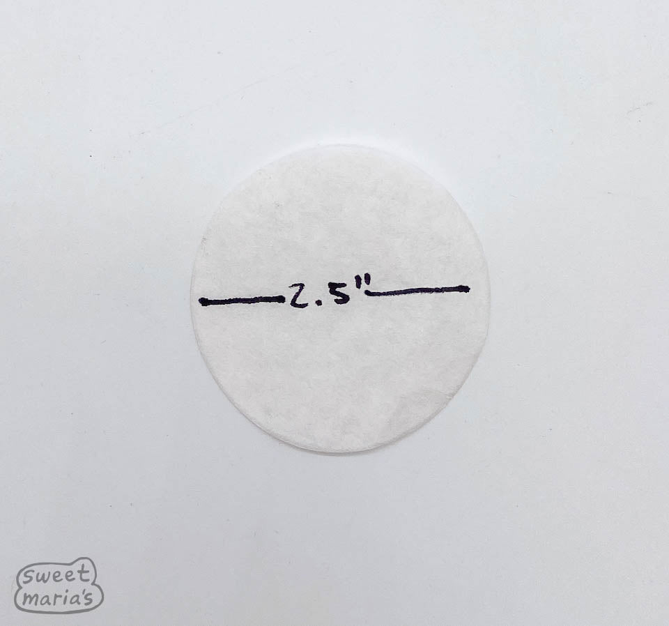 The AeroPress filter is a 2.5 inch simple disc of good quality coffee filter material