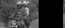 This could be a Burundian boda boda driver, or just friends/family. Whatever the case, it's quite common to ride "3-up" or more in East Africa. 
