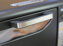 Front door handle of the Behmor 2000AB Plus electric coffee roaster. 