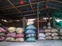  where farmers are paid premium on top of the base price they received when selling their coffee. Inzá