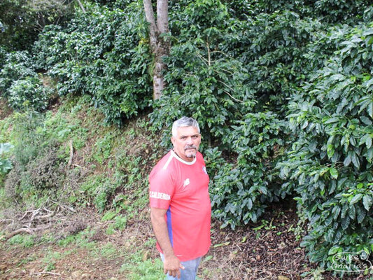 Rodolfo Valverde poses for a photo at his farm, 
