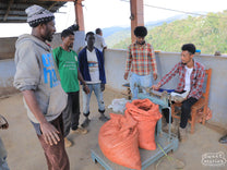 Coffee is weighed on delivery at the receiving station of another of the coffee sites run by the folks from Guji Goro.