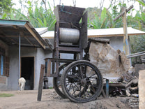 A rolling coffee depulper at one cooperative member's home is shared by many neighbors during the harvest (and easily moved!).