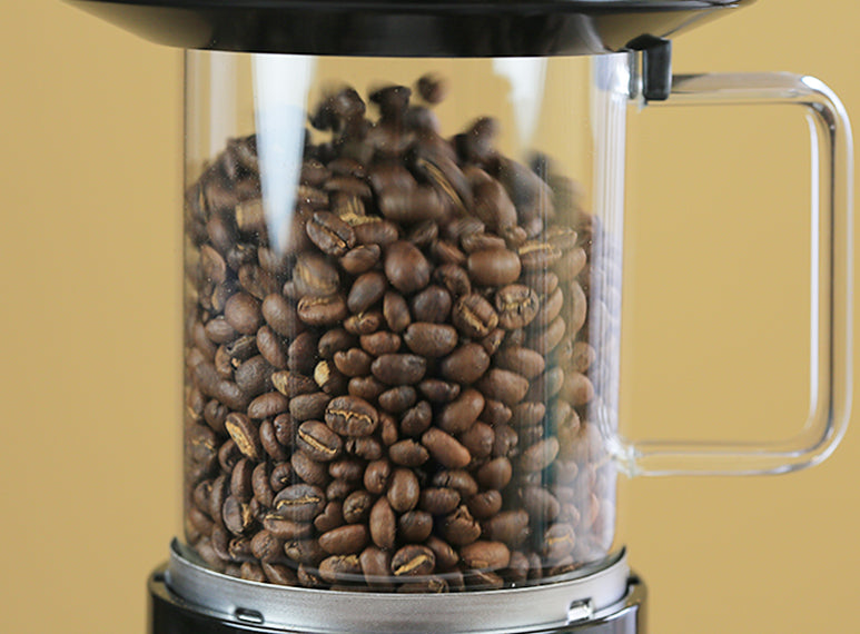 Close-up of beans circulating in the roast chamber. The SR800 supports 8 oz of beans per batch. 