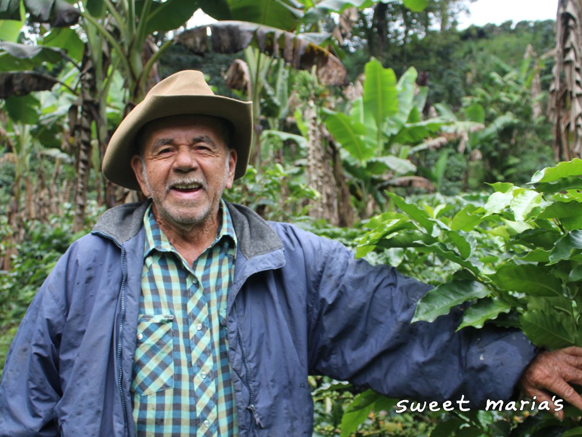 Alejandro Guzman smiles for a photo at his farm in El Sauce, Honduras.