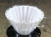The Wave Glass Dripper by Kalita requires Kalita 185 cupcake filters