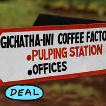 Hand-painted sign at the Gichathaini coffee factory pointing the way to the pulping station where the coffee cherry is removed from the green seeds. Nyeri, Kenya.