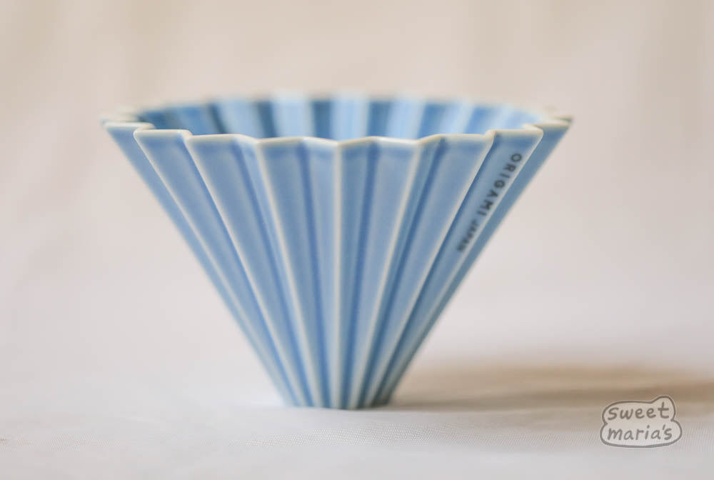 The Origami Ceramic Coffee Dripper, Size Medium, can use Hario V60 or Kalita Wave type filters