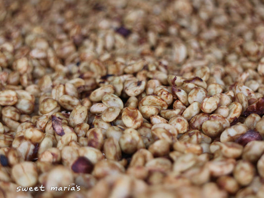 Honey process coffee with fruit mucilage still intact that has turned a dark red color as it dries. Vereda Páramo, Aponte.