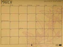 Sample calendar page of our 2026 "Dogs" of Coffee Calendar (March).