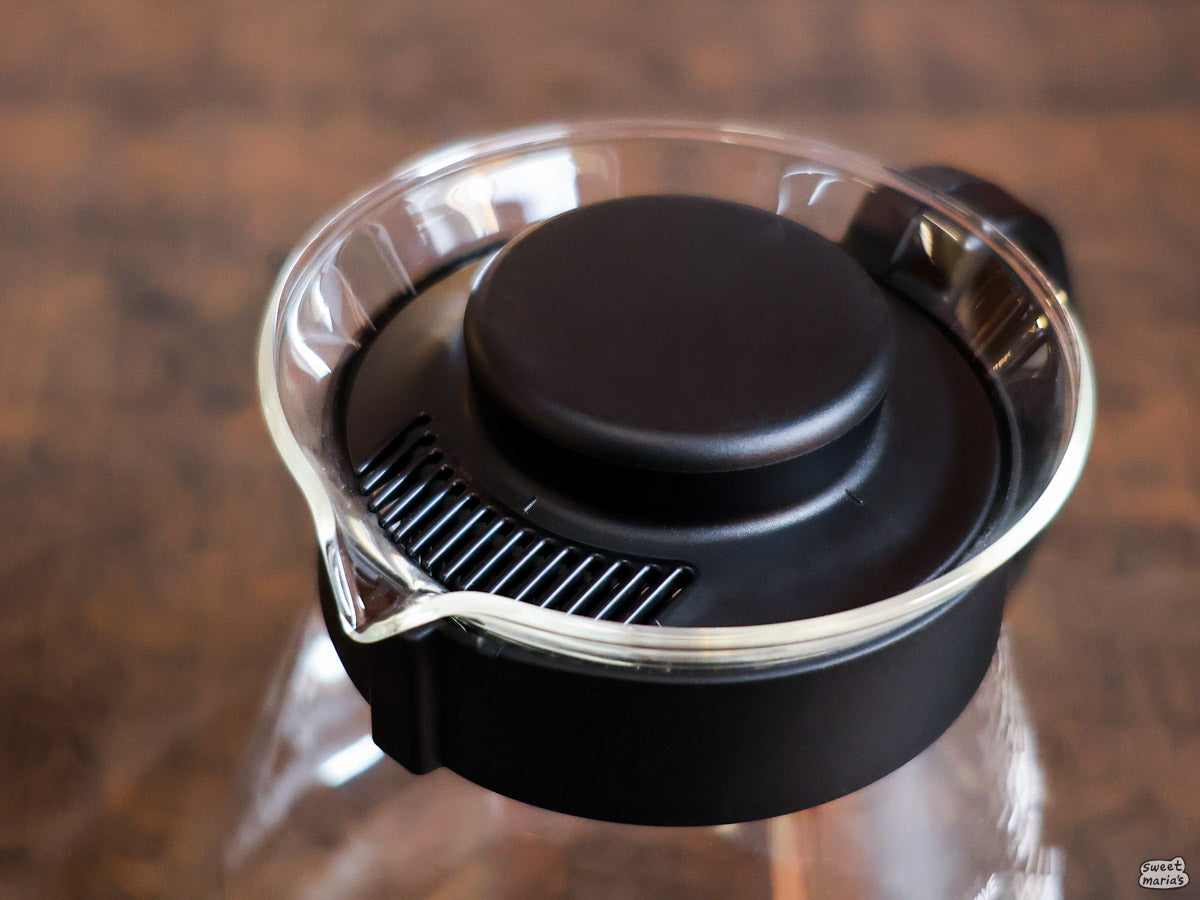 The Hario V60 Glass Carafe features a pop-off lid with simple flow control.