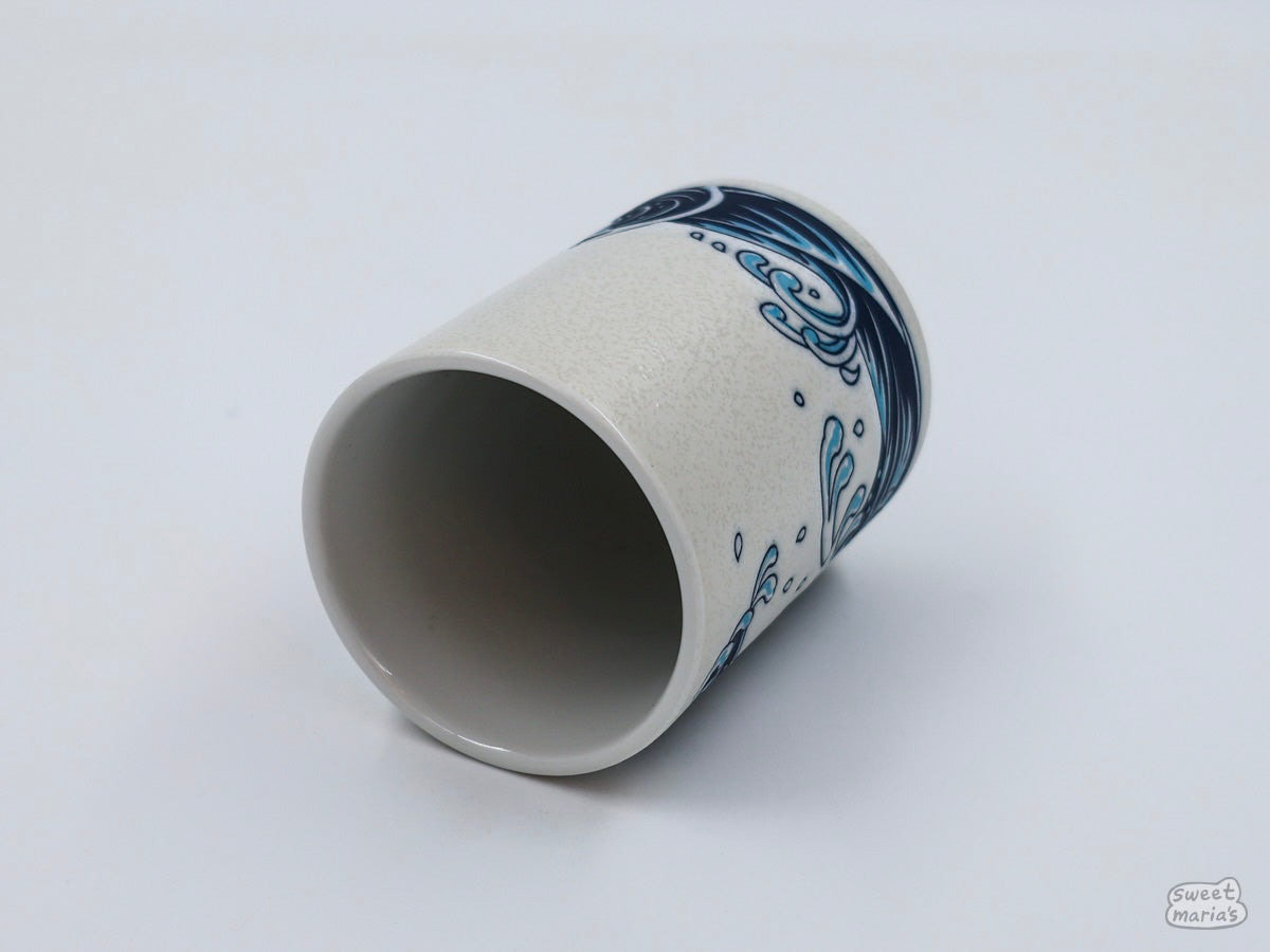 A close up of the Red Seabream & Waves Cup's pebble-like texture.