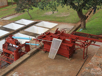 The disk pulper at Kateshi Estate that empties into the white, concrete fermentation tanks below.
